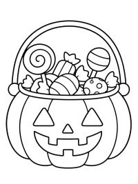 Seau citrouille d'Halloween rempli de bonbons
